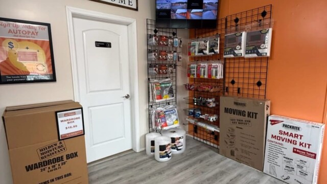 Office supplies for sale and a TV with security camera footage